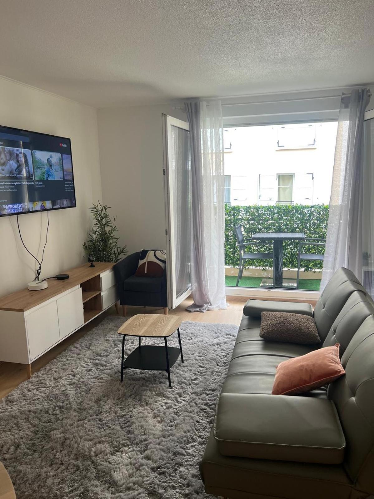 Champion Suites Sarcelles Chambre photo